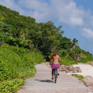 AGirlInASwimsuitOnTheBikeOnLa