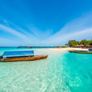 ColorfulExoticSeascapeWithBoatsNearZanzibarShoreInAfrica