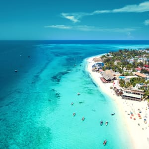 AerialViewOfNungwiBeachInZanzibarTanzaniaWithLuxury