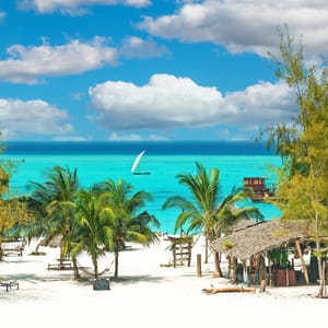 BeautifulTranquilEmptyBrightWhiteParadiseSandBeachSunBeds