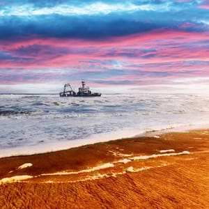 TheShipwreckInTheAtlanticOceanOnSkeletonCoastNear