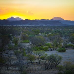 SunsetAtTwyfelfonteinAreaInNamibiaTravelAndTourism
