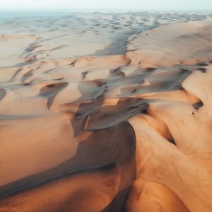 AerialDuneTexturesOfNamibianDesertSunsetAtSwakopmundNamibia