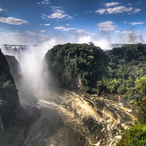 VictoriaFallsLocatedOnTheZambeziRiverOnTheBorder